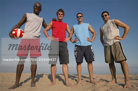Group Portrait of Men on Beach