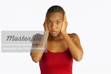 Woman Covering Ears