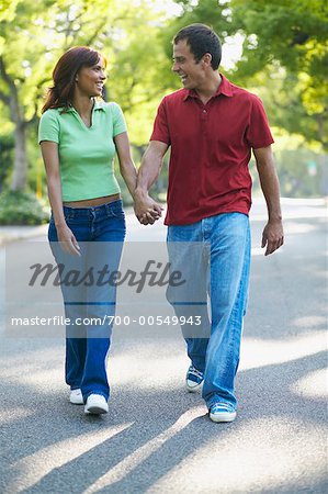 Couple Walking down Street