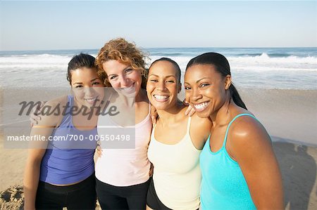 Women Posing On The Beach