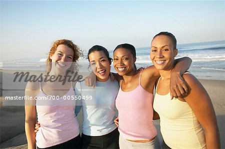 Women Posing On The Beach