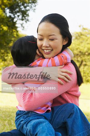 Mother and Daughter Hugging