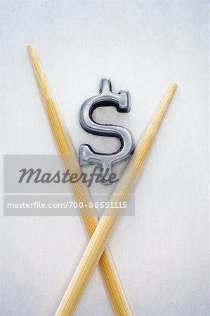 Chopsticks Holding Dollar Sign
