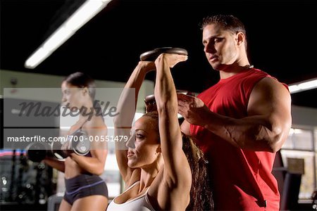 People Exercising in Gym