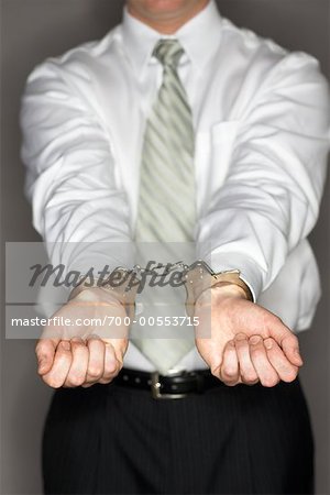 Businessman with Handcuffs