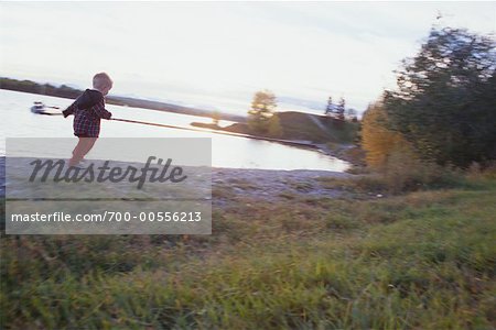 Child On Riverbank, Calgary, Alberta