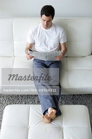 Man Reading Newspaper