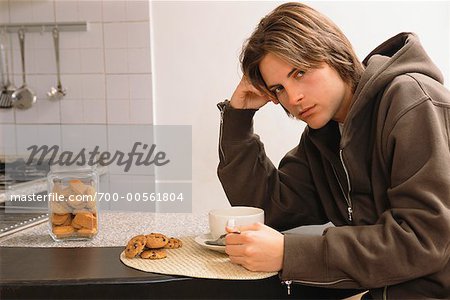 Young Man Eating Cookies