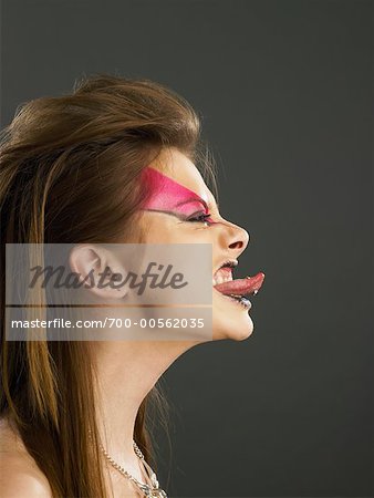 Portrait of Woman Sticking out Tongue