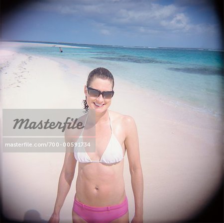 Woman In Bikini On Beach, Cayman Islands