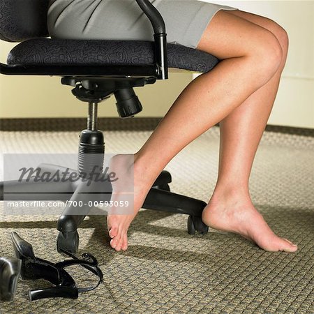 Girl Sitting on Giant Chair Stock Image - Image of barefeet