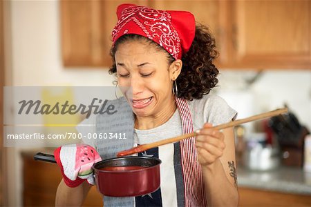 Mixed Race African American Woman Cooking Kitchen Stock Image - Image of  cooking, looking: 36498271
