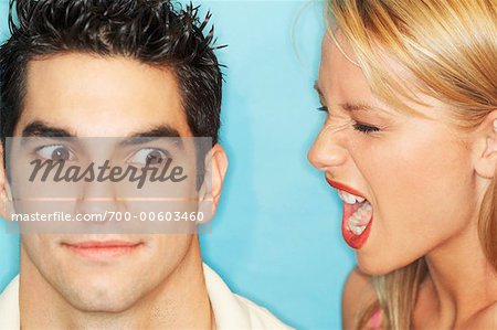 Close-up Portrait of Woman Screaming at Man