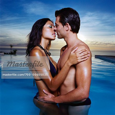 Couple Kissing in Swimming Pool
