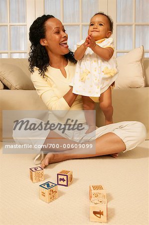 Portrait of Woman Holding Baby