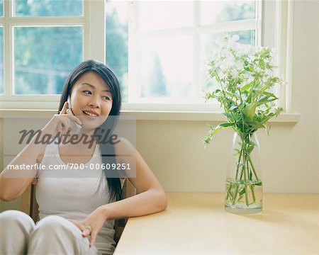 Woman Talking on Telephone