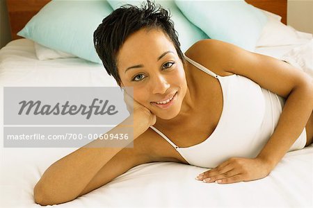 Portrait of Woman Lying on Bed