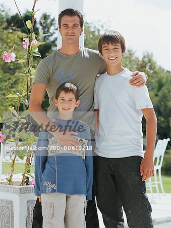 Portrait of Father and Sons Outdoors