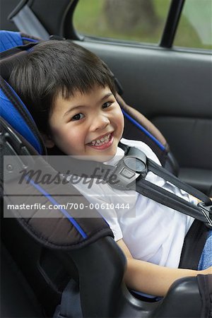 Portrait of Boy in Car Seat