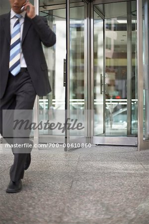 Businessman Using Cellular Telephone