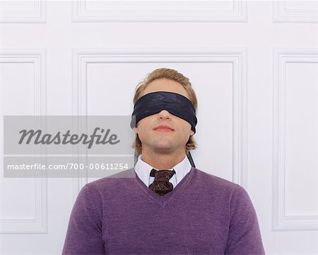 blindfolded man Stock Photo