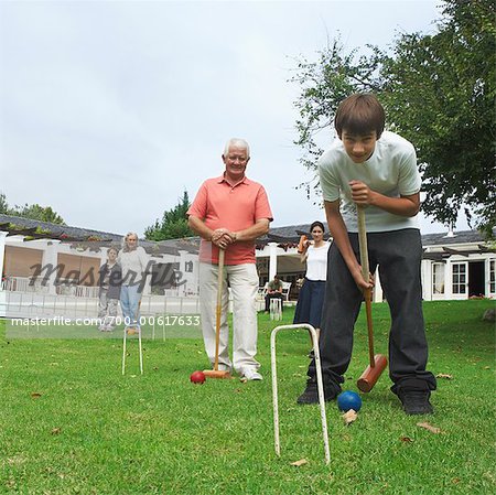 Family Playing Croquet