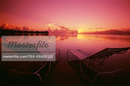 Beach Chairs Facing Sunset, Moorea, Tahiti, French Polynesia