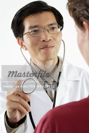 Doctor Examining Patient