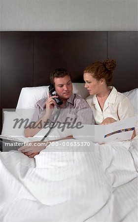 Couple Ordering Room Service