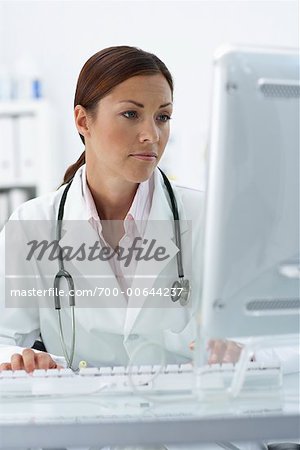 Doctor Working at Computer