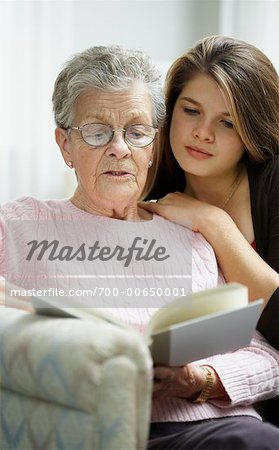 Grandmother and Granddaughter Reading Book