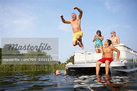 Man Jumping From Boat