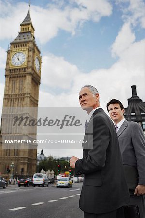 Businessmen Standing on Westminster Bridge, London, England