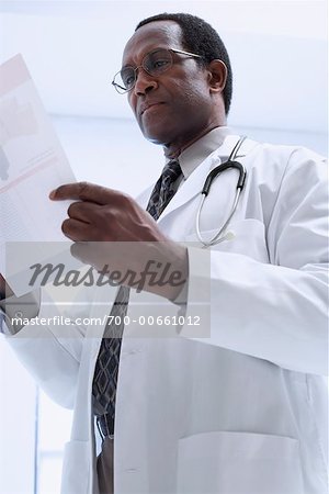 Doctor Reading Letter