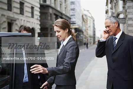 Business People on the Street, London, England