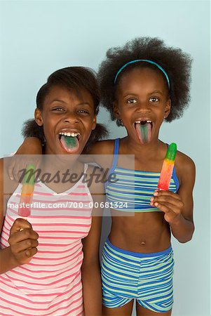 Portrait of Sisters With Popsicles