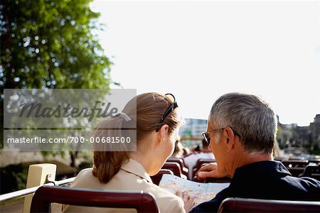 Couple on Double-Decker Bus, London, England