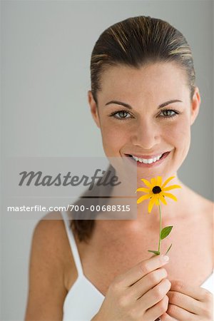 Potrait of Woman Holding a Flower