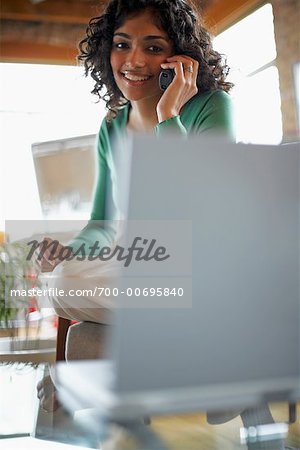 Woman Using Cordless Phone