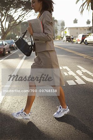 Businesswoman Crossing Street