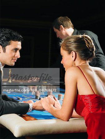 Croupier and Players At Card Table