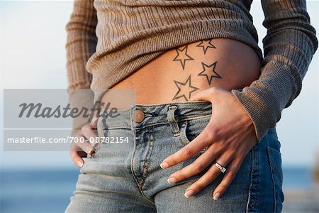 Stomach tattoos for women Stock Photos  Page 1  Masterfile