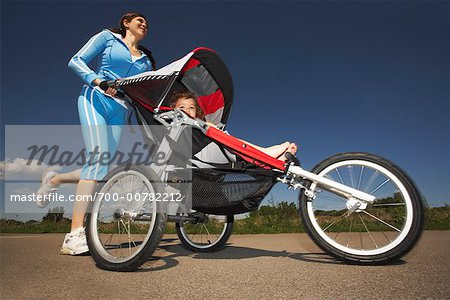 Woman Pushing Stroller