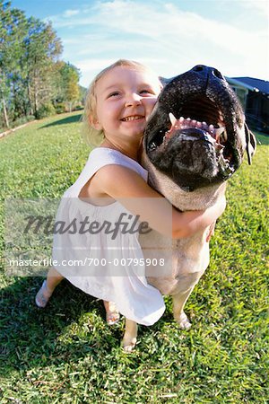 Girl Hugging Dog