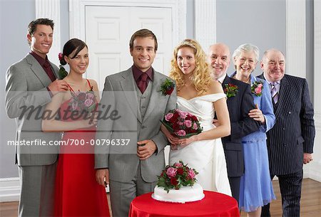 Portrait of Bride and Groom With Family and Wedding Party