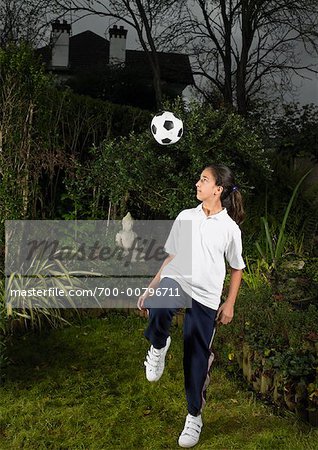 Girl Playing with Soccer Ball