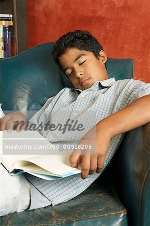 Boy Sleeping in Armchair