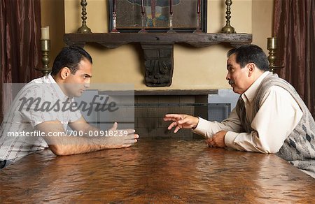 Two cowboys talking pictures Stock Photos - Page 1 : Masterfile