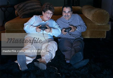 Couple Playing Video Game - Stock Photo - Masterfile - Premium