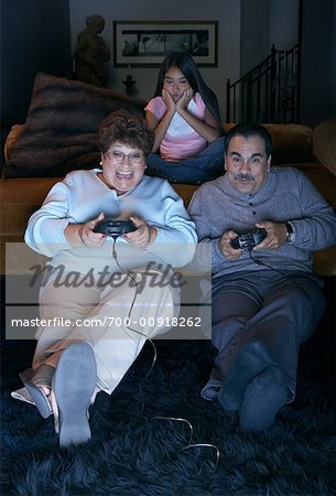 Couple Playing Video Game - Stock Photo - Masterfile - Premium